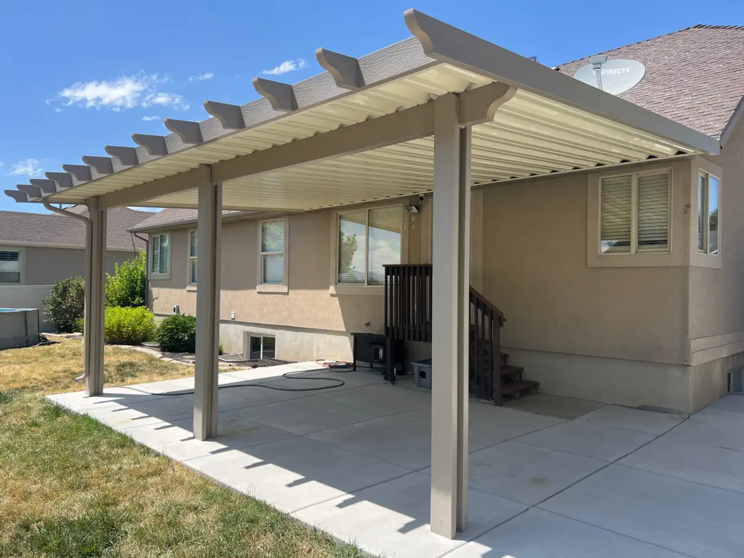 24x16 Steel Patio Cover with Beige Gutters in Syracuse