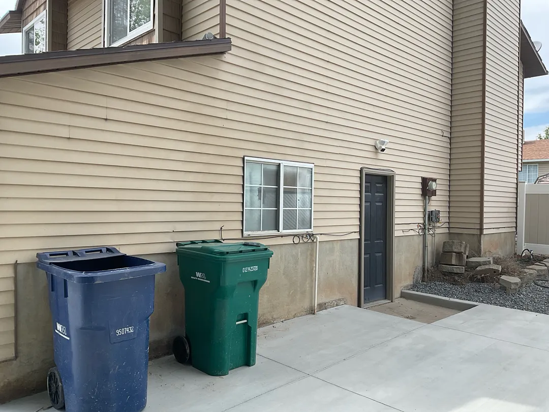 New Carport Installation with Custom Drainage in Roy, UT
