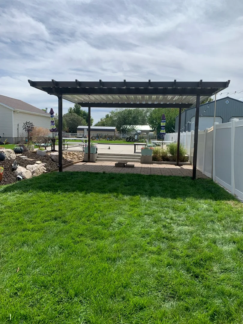 Patio Cover Installation with Footings and Top Wrap in Roy, UT