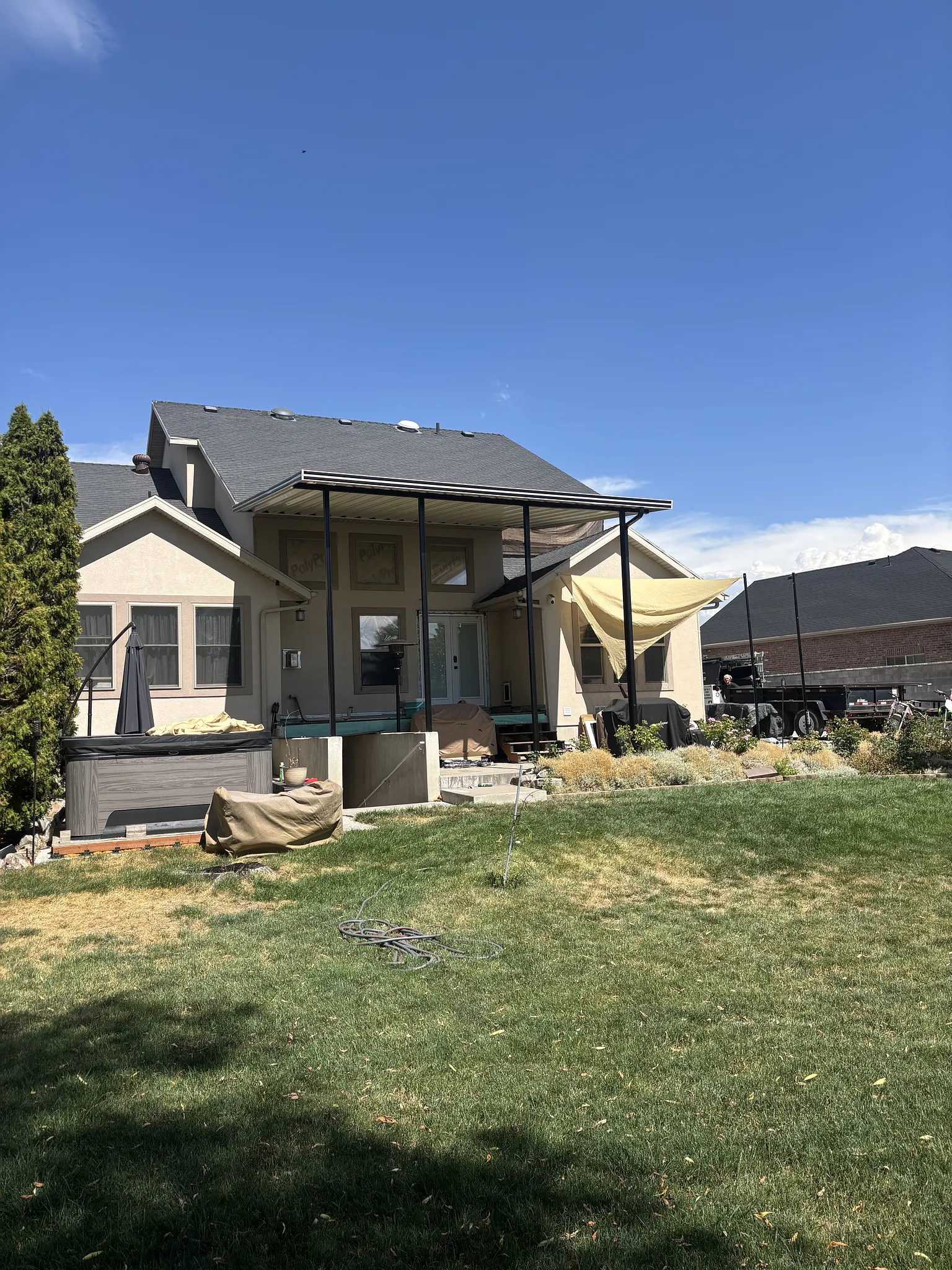 Stunning Black and Cream Steel Patio Cover in West Point